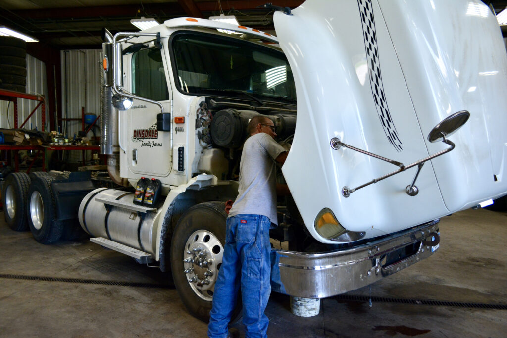 A Tony's mechanic working on a truck, providing expert repair services in Northern Iowa.