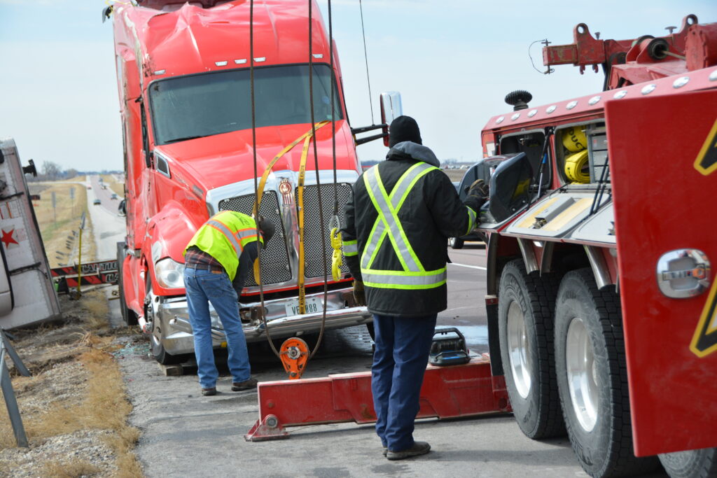 Tony's dedicated team working together to rescue a semi truck stuck in a ditch in Northern Iowa.